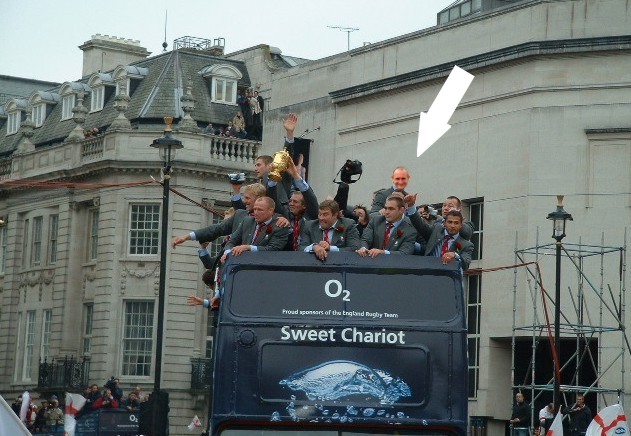Burns on the open top bus.